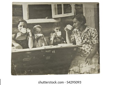 Tea in a Ukrainian village, an old picture - Powered by Shutterstock