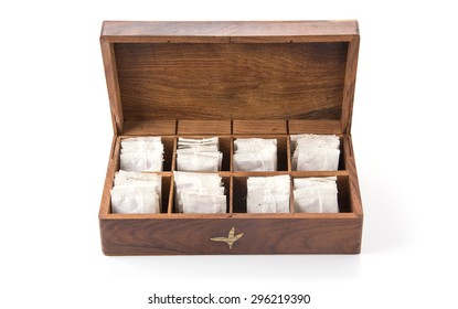 tea in wood box on white background