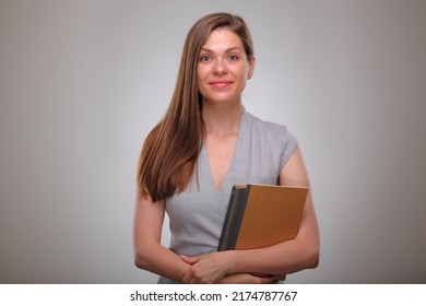 teacher or adult student book or workbook holding, Isolated business woman portrait, smiling female business person.