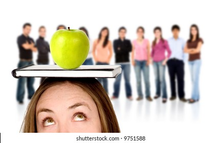 teacher with an apple in front of many students - isolated over a white background - Powered by Shutterstock