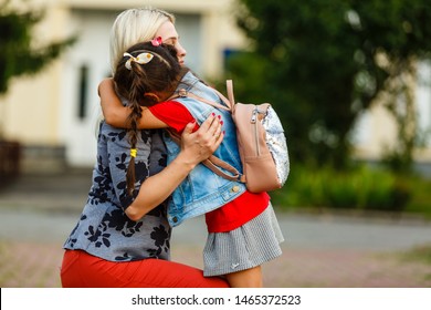 Teacher Comforting Upset Elementary School Pupil