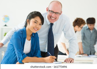 Teacher Helping His Student