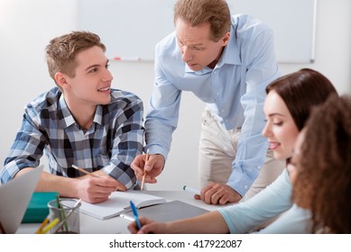 Teacher Helping The Student 