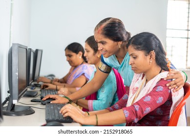 Teacher Helping Or Teaching Students During Computer Class Training - Concept Of Learning, Personal Support And Technology.