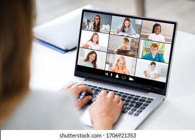 Teacher Hosting Online Class Using Video Conference On Laptop