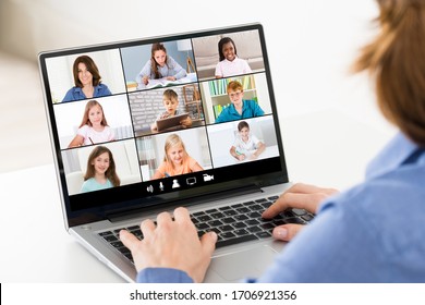 Teacher Hosting Online Class Using Video Conference On Laptop