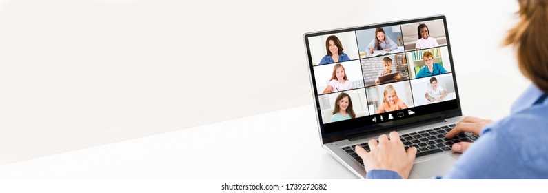 Teacher Hosting Online Class Using Video Conference On Laptop