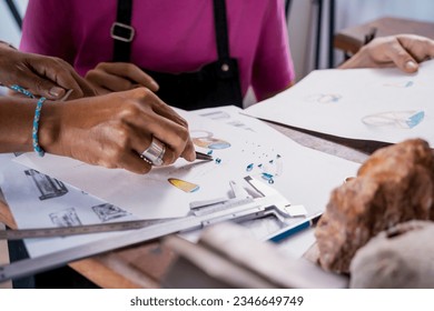 Teacher jeweler and student make jewelry in workshop - Shutterstock ID 2346649749