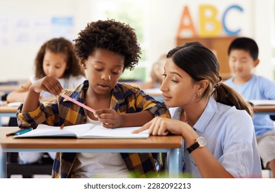 Teacher, learning and helping black kid in classroom for knowledge, studying or assessment. Teaching, development and boy or student with woman for education answer in notebook in kindergarten. - Powered by Shutterstock