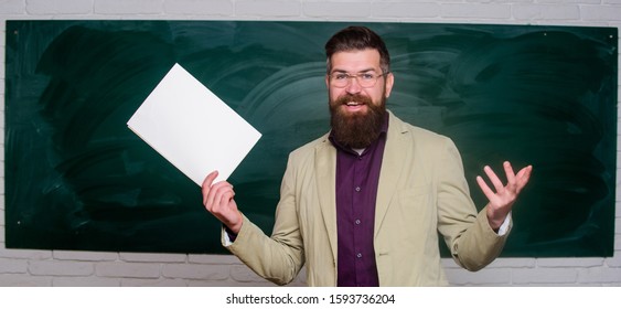 Teacher Paperwork. School Principal. Demanding Teacher. Lecturer In Classroom. Explaining Theory. College And High School. Prepare For Test. Teacher Bearded Man Hold Documents Chalkboard Background.