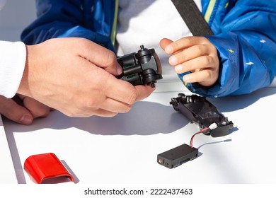 Teacher With Pupils Hand Science Lesson Studying Robotics. Modern Training. E-learning. Modern Teaching Technology. Education