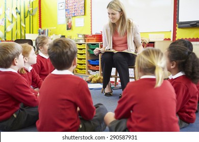 Teacher Reading Story To Elementary School Pupils - Shutterstock ID 290587931