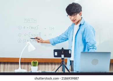 Teacher remotely using camera to stream lesson working call video conference teaching online in blackboard to student