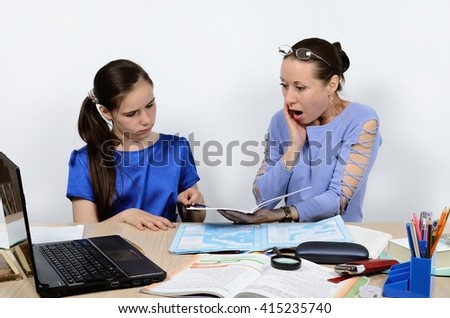 Teacher is surprised by result of work schoolgirl