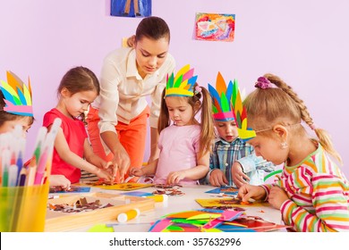 Teacher Teach Preschool Kids In Art Class