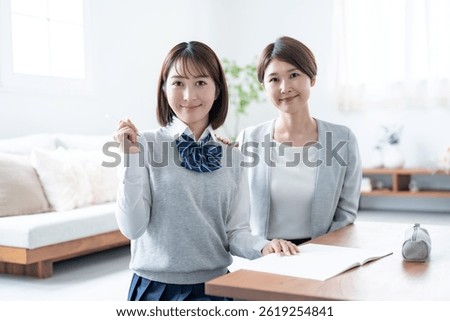 A teacher teaching students in a room