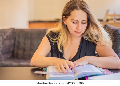 Teacher, Tutor For Homeschooling At The Table