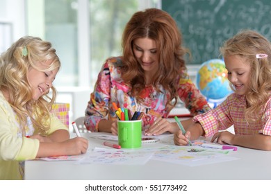 teacher with two girls 
