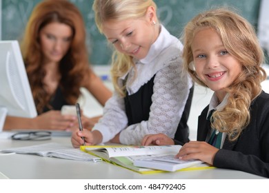  teacher with two girls at lesson