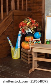 Teachers Day. Back To School. Empty Classroom With Blackboard And Wooden Table. Kindergarten. Interior Of Elementary School. Chalkboard, Backpack, Pencils And Stationery On Classroom. 