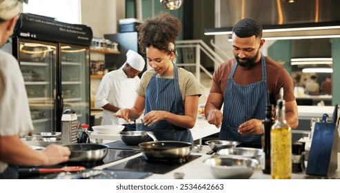 Teaching, chef and mentor in kitchen, cooking and listening to instruction, helping or skills in hospitality. Professional, apprentice and learning of culinary student, people or smile in fine dining - Powered by Shutterstock