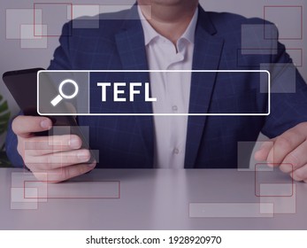 Teaching English as as foreign language TEFL text in search bar. Broker looking for something at cellphone. Teaching English as as foreign language TEFL concept. You can achieve your accredited TEFL
