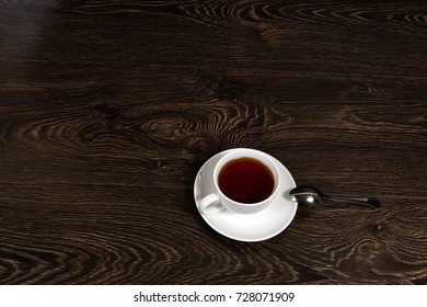 teacup with tea on the table