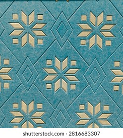 Teal blue geometric pattern background with traditional carved star shapes