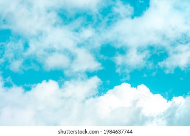 Teal Blue Sky With White Clouds, Vibrant Cloudscape