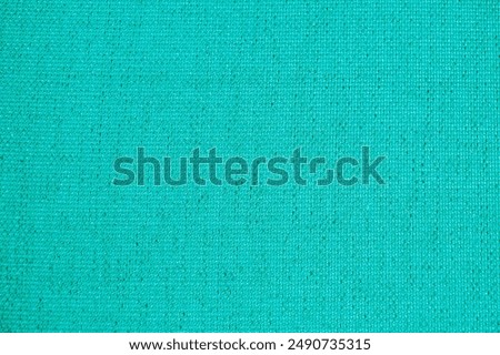 Teal fabric texture background. Backdrop of flat lay fabric. Textured textile wallpaper. Abstract mint surface for graphic design. tweed texture, close up of fabric