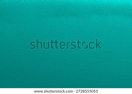 Teal leather texture background.Use for jacket sofa book cover tag shoes.Rich blue leather jacket close up, macro Turquoise leather jacket texture, soft rugged grain pattern surface fashion design bg
