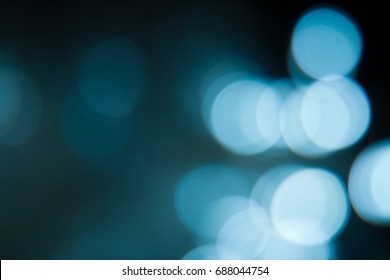 Teal Light Bokeh. Defocused Of Teal Light On Black Background