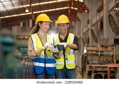 Team Asian engineer working control machine in factory. Group people Asia Worker control machine with manufacturing of industry. - Powered by Shutterstock