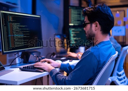 Team Asian software engineer or programmer team working late in development office,problem solving or algorithm of ai assistant helping for work.software developer,digital technology security concept
