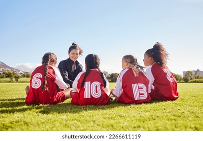 Team building, planning or coach with children for soccer strategy, training and sports goals in Canada. Sport, friends and woman coaching group of girls on football field for game, match or workout - Powered by Shutterstock