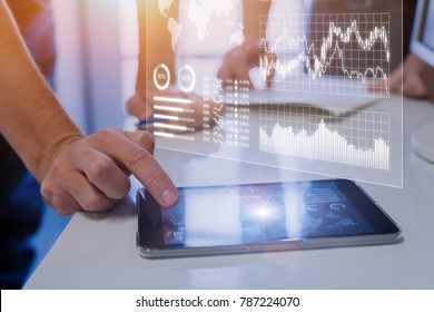 Team Of Business People Analyzing Marketing, Sales, Operations, Financial, Or Trading Metrics On Digital Analytics Report Dashboard With Key Performance Indicators (KPI)