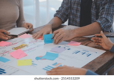 Team of business people working together in the meeting room office, teamwork background charts and graphs banner, double exposure successful teamwork,business planning concept. - Powered by Shutterstock