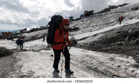 A Team Of Climbers Ascending An Icy Slope On Mt. Everest Across The Sky Above. Clip. People Enjoying Climbing A Snowy Path.