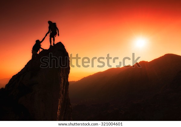 Team Climbers Help Conquer Summit Teamwork Stock Photo (Edit Now) 321004601