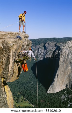 Similar – Rock climbing team bivouaced in a storm.