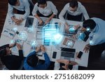 A team collaborates on a digital security strategy in a modern office. Various technology icons surround them, illustrating their focus on protecting data and information. Trope