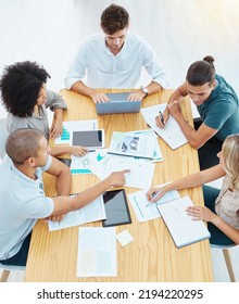 Team, Collaboration And Documents Of Business People In Teamwork Strategy, Planning And Meeting At The Office. Group Of Workers In Research And Development For Design And Marketing With Technology.