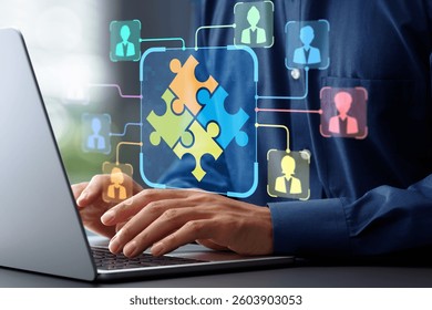 Team collaboration platform and knowledge sharing solutions. Discussion forums for project management. Businessman using laptop computer for messaging team.