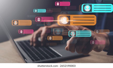 Team communication and knowledge sharing concept showing digital messaging bubbles on a laptop screen for collaborative online interaction.