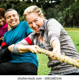 Team Competing In Tug Of War