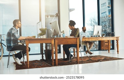 Team, computer or typing in office for creativity, market research or storytelling at creative agency. People, diversity or technology at table for SEO, brainstorming or proofreading article in city