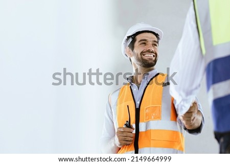 Team Construction or engineering group and worker. Teamwork and determination to succeed. Safety hard hat to prevent accident while working Transport and Container Team. Concept Restart and new Normal