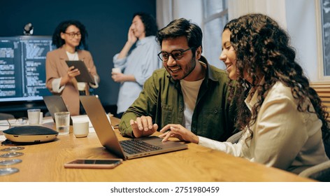 Team Design Collaboration, Designers And Developer Collaborate On Prototype Adjustments In Bright Office - Powered by Shutterstock - Get 15% off with code: PIKWIZARD15