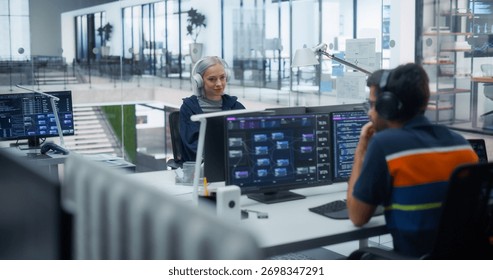 Team of Diverse Multiethnic Software Developers Working on Computers, Developing Artificial Intelligence Projects. Portrait Focused on a Creative Female Specialist Wearing Headphones