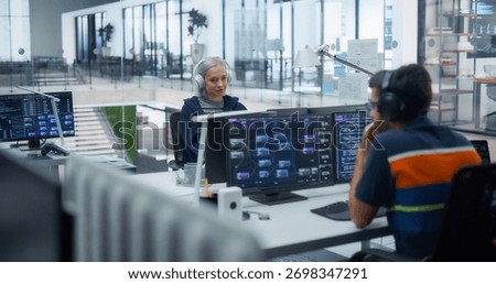 Team of Diverse Multiethnic Software Developers Working on Computers, Developing Artificial Intelligence Projects. Portrait Focused on a Creative Female Specialist Wearing Headphones
